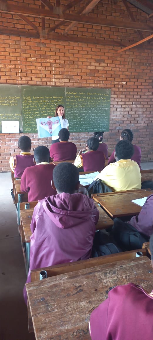 Pupils in a poor community receiving menstrual cup education.
