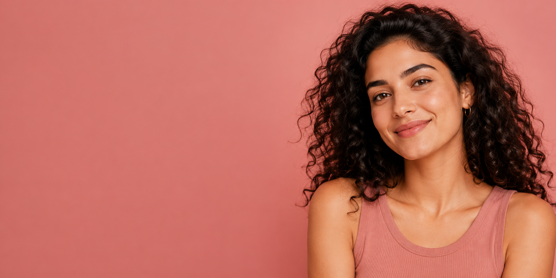 Woman smiling on the Flo Angel guide showing how to insert a menstrual cup for comfortable leak-free period care